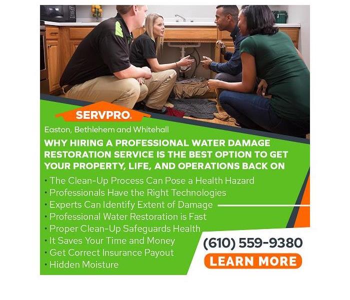 SERVPRO experts with clients